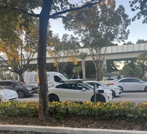 A Waymo robotaxi pictured outside of the Leesfield & Partners Miami office in the evening on U.S. 1.